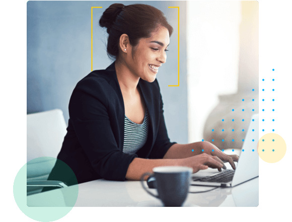 Professional female working at a desk - HealthStream Policy Manager